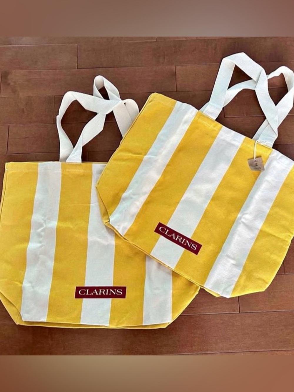 2/12$ Clarins Yellow & White Striped Tote Bag